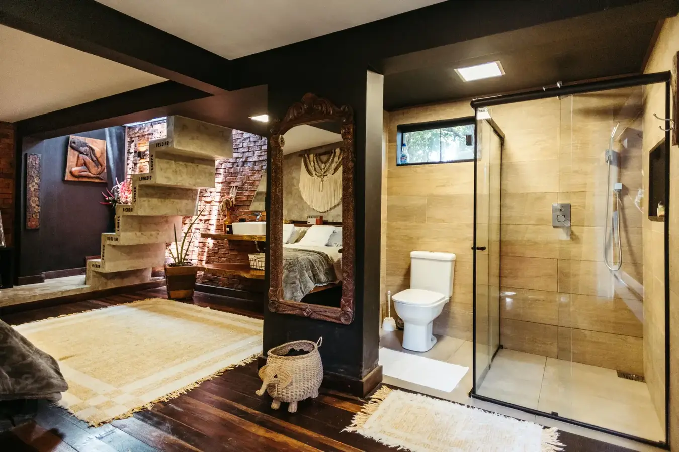 An open-plan guest suite with a walk-in shower
